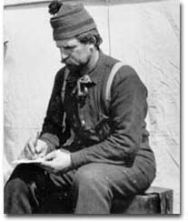 Hamlin Garland taking notes on the Klondike Trail